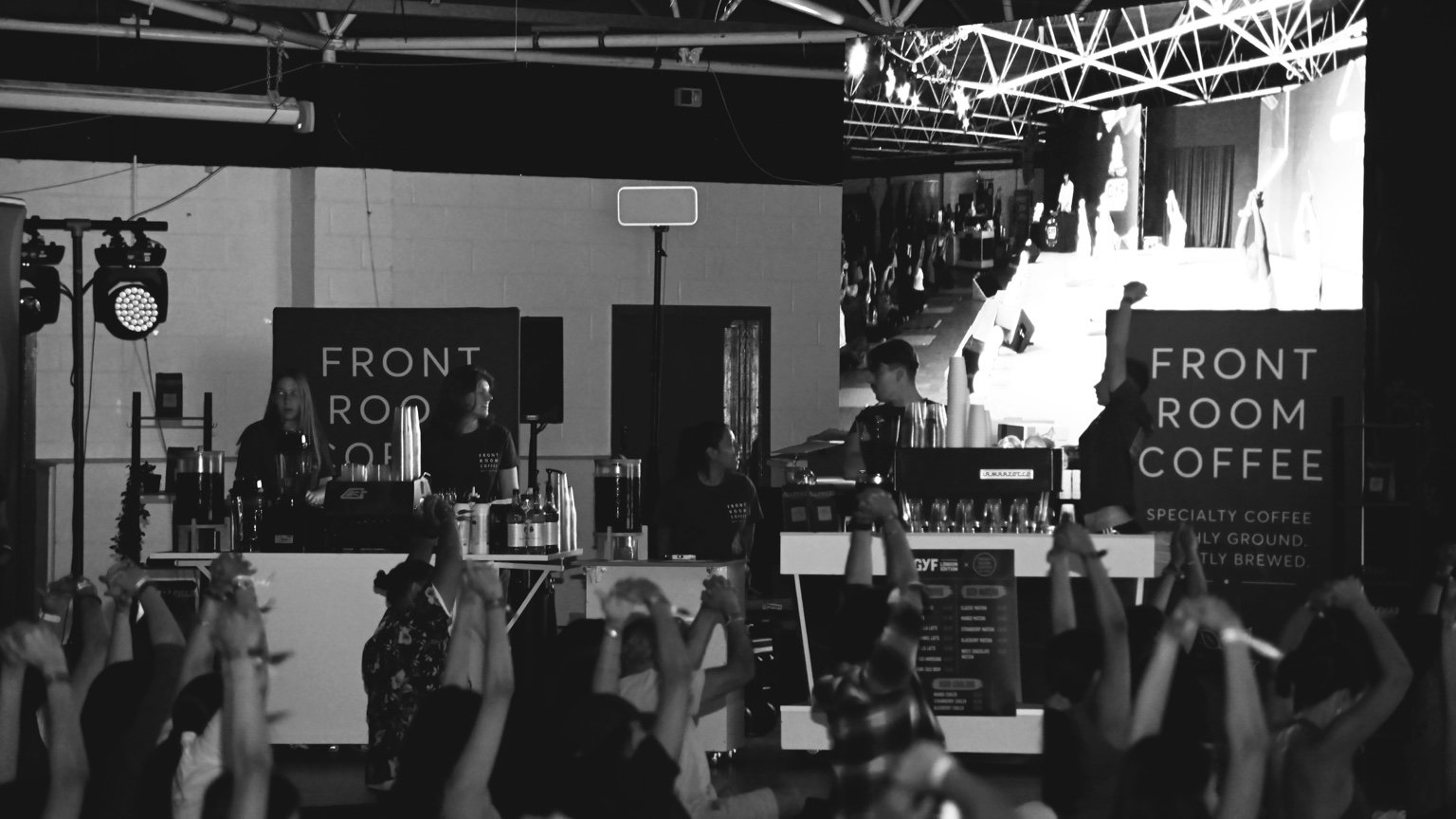 Front Room Coffee baristas serving a busy coffee rave